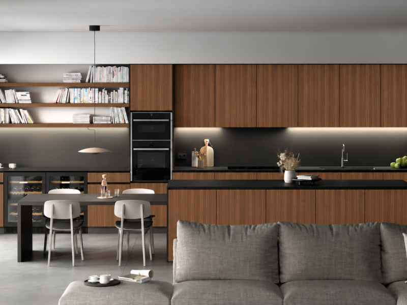 Living: a kitchen with a multifunctional island that doubles as a table or desk